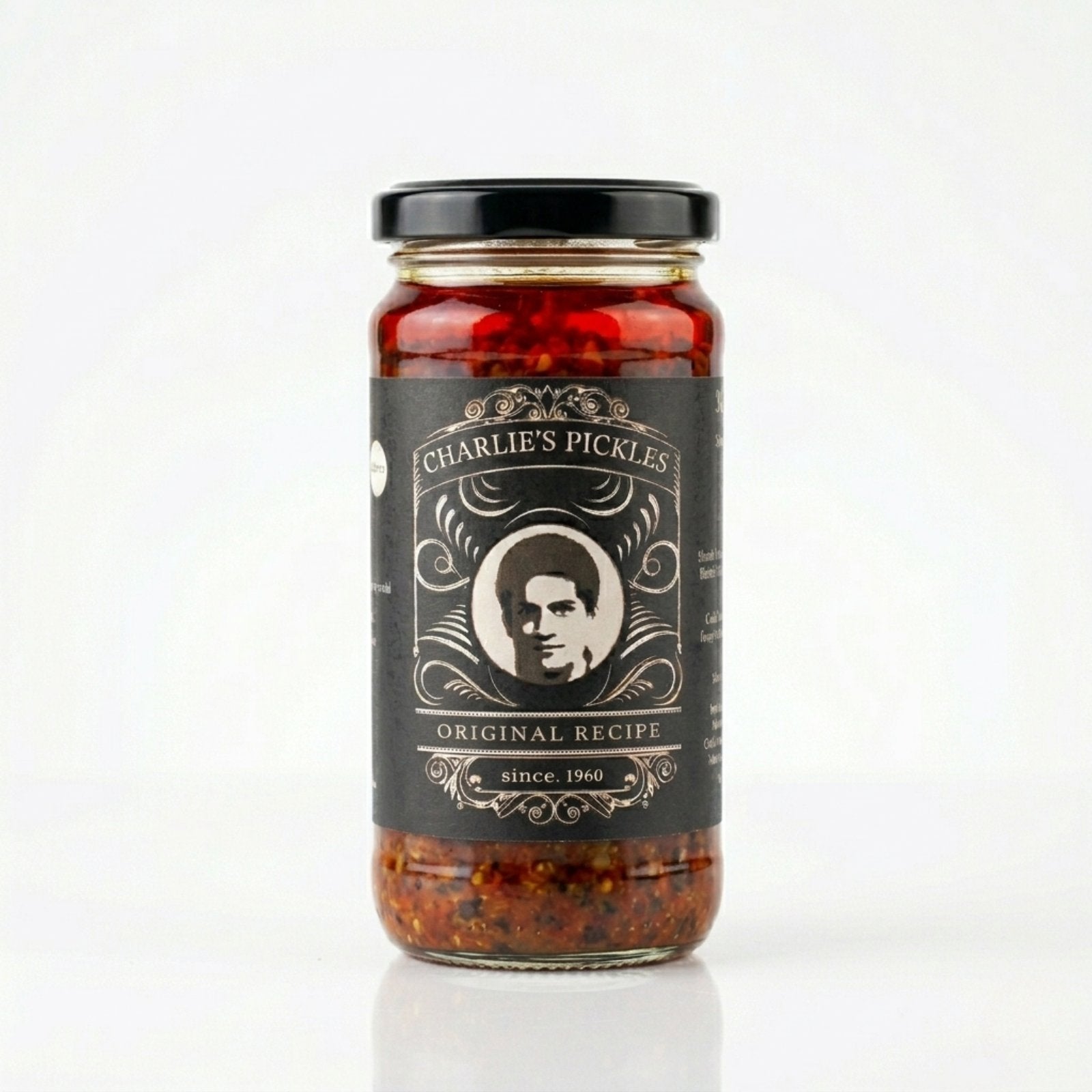 Jar of Charlie's Pickles with a label on a white background