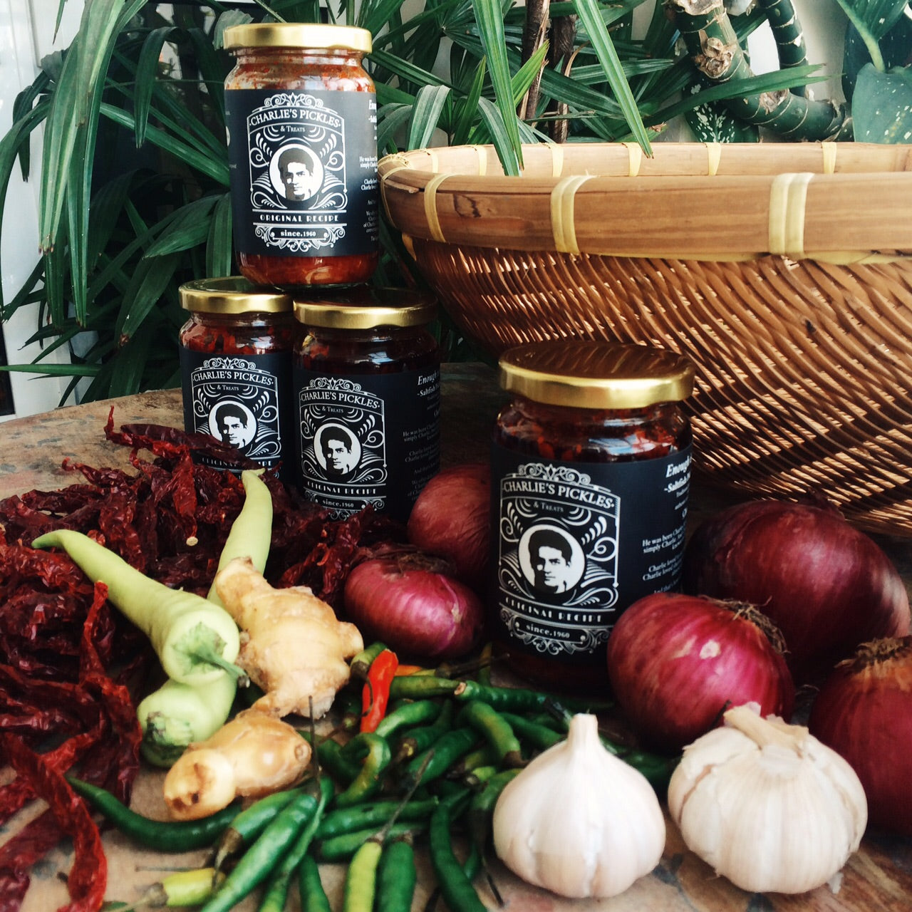 Ingredients on a wooden table with jars stacked